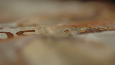 beautiful macro dolly of several 50 euro paper bills in cash