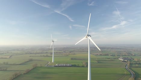 Aerial-view-of-a-windturbine-countryside-in-the-rising-sun-1