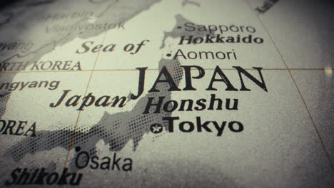 close-up of a world map, showing japan and its surrounding areas