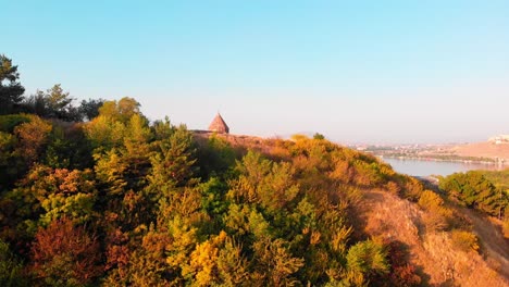 aerial zoom in view sevanavank armenian monastery complex in sevan city with blue lake panorama at sunrise . famous landmark sightseeing in caucasus. armenia travel concept