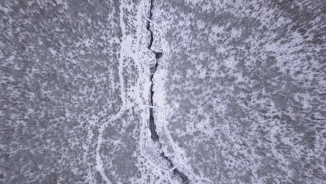 High-vertical-aerial-flyover-of-dramatic-Marble-Canyon-in-winter