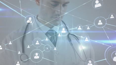 Animation-of-profile-icons-connected-with-lines-over-male-caucasian-doctor-using-digital-tablet