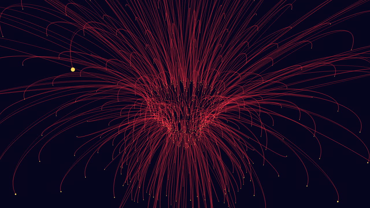 Vibrant fireworks illuminate night sky with red and yellow sparks