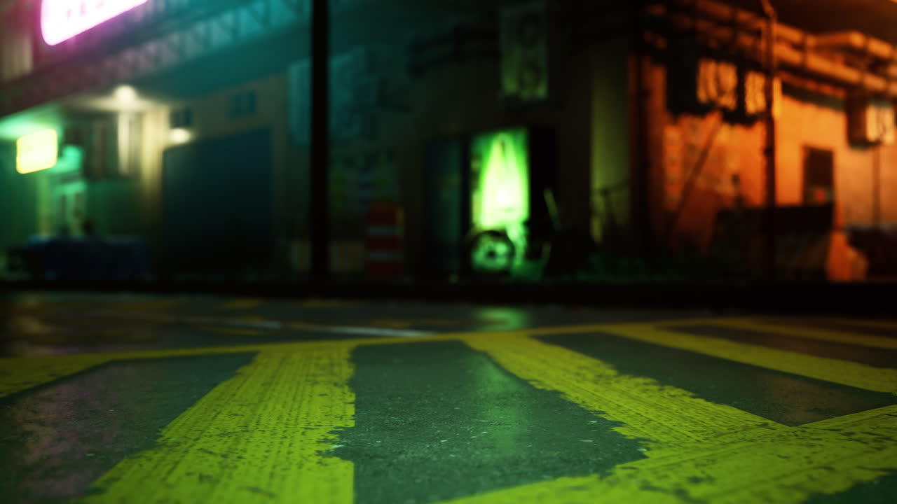 Urban nighttime view of a colorful alley with vibrant lights and shadows