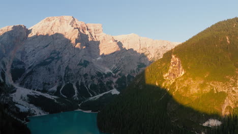 aerial view of the lake braies ( lago di braies ) dolomites, italy during sunrise