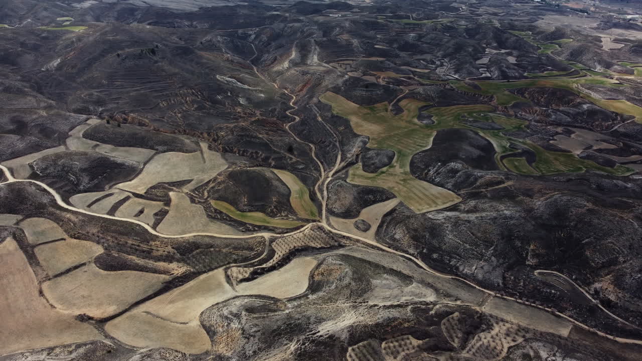 Aerial View of Terraced Fields and Mountains