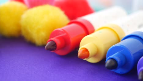 close-up of colorful markers