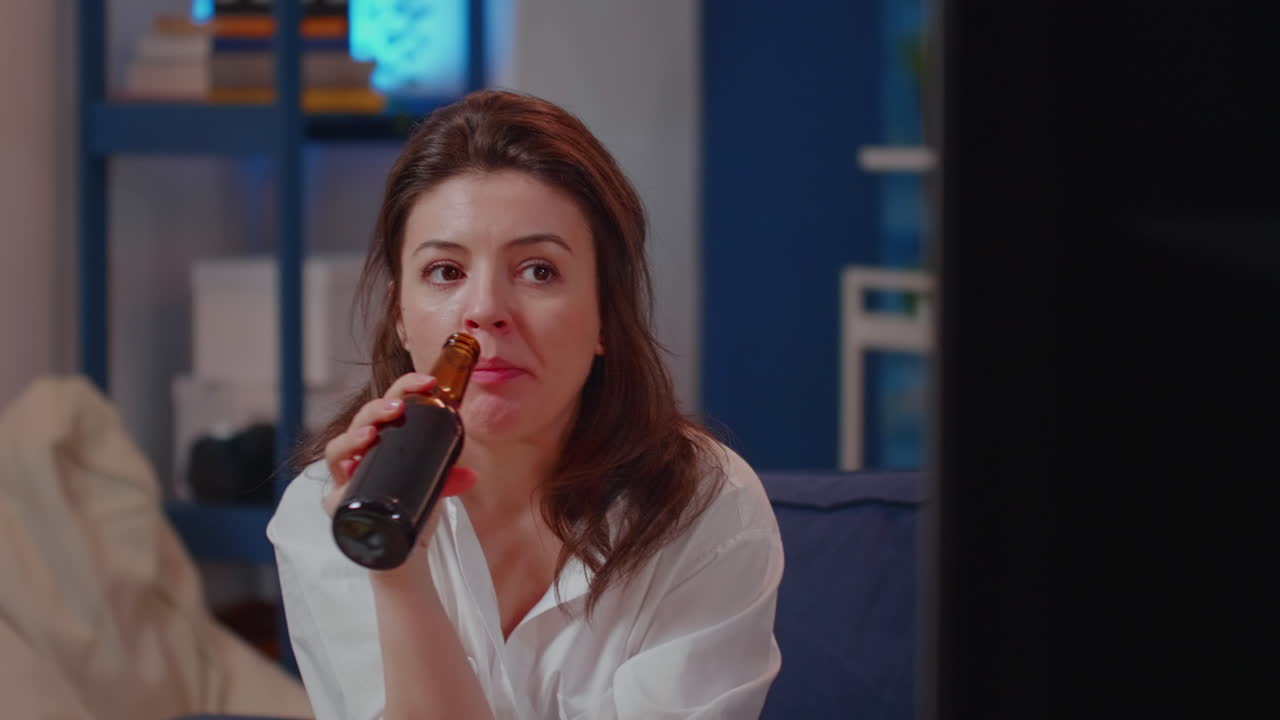Close up of woman placing box of pizza on table