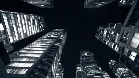 a stunning night view of modern skyscrapers illuminated against the dark sky, showcasing architectural marvels surrounded by glass and steel at twilight.