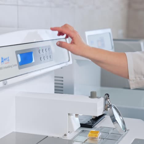 technician holding samples in laboratory. young lab assistant testing samples in hospital