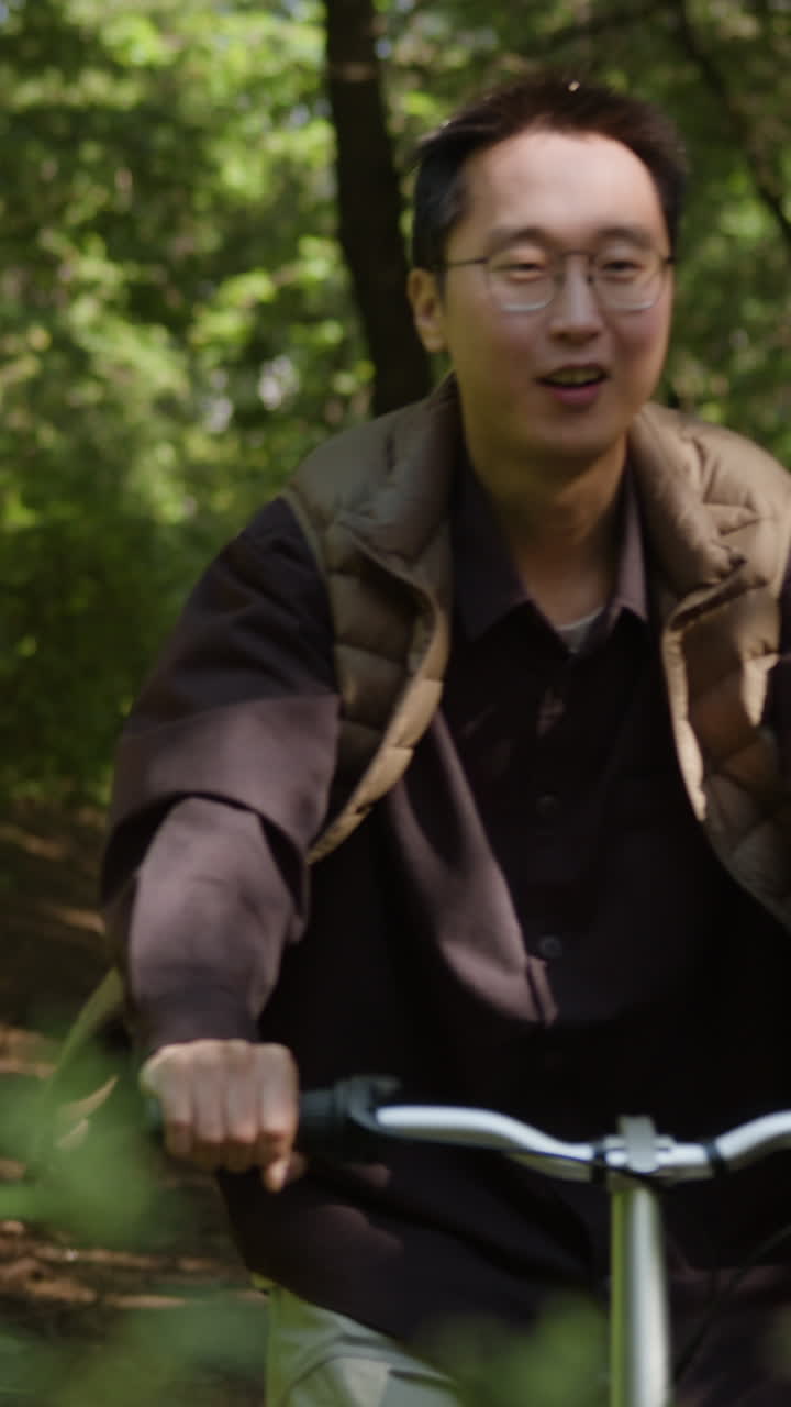 Man riding a bicycle in the forest