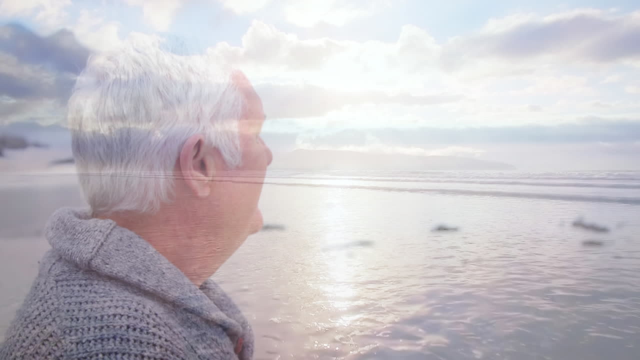 Old man enjoying the beach scenery