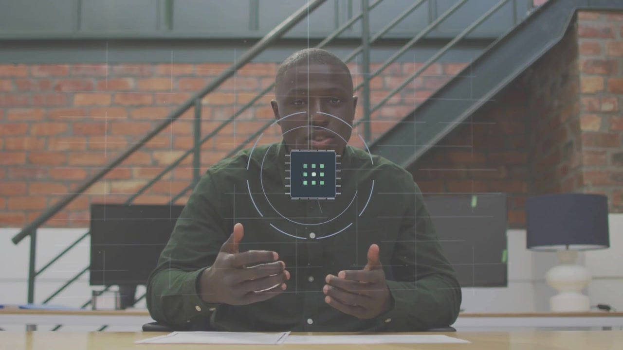 Host seated at desk pointing papers speaking starting HUD expanding into chip grid showing STEALTH