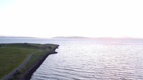 aerial footage at sunset of the berkeley marina in california