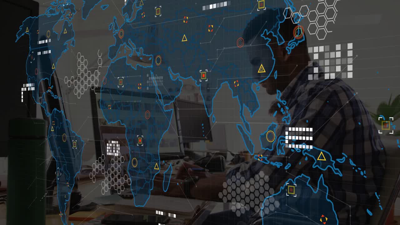 Man typing on laptop, causing map overlay with hex grids warnings tracking network data over Asia