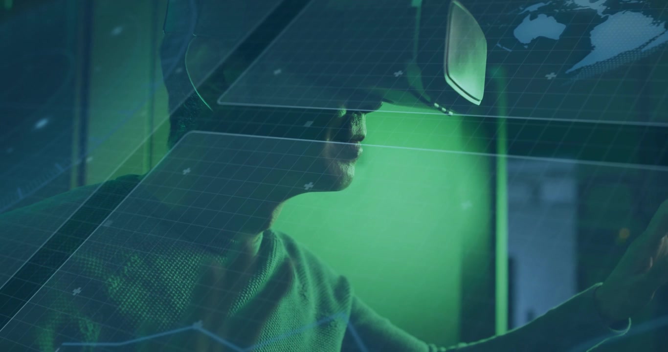 Zralý muž s VR headsetem zvedá ruku a posouvá plovoucí datové panely pro analýzu v reálném čase.