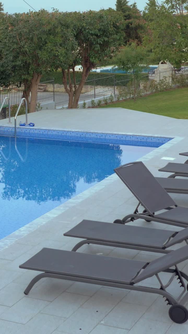 Swimming Pool with Lounge Chairs