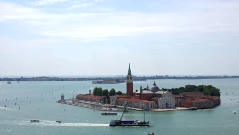 san giorgio maggiore basilica in island with several boats around