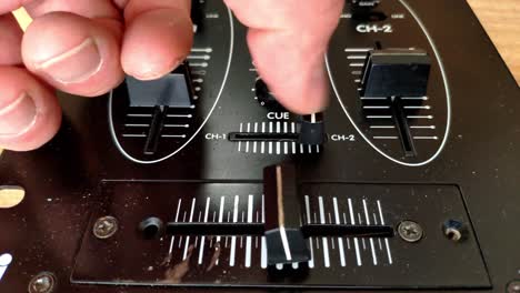 Close-up-of-a-DJ-mixer