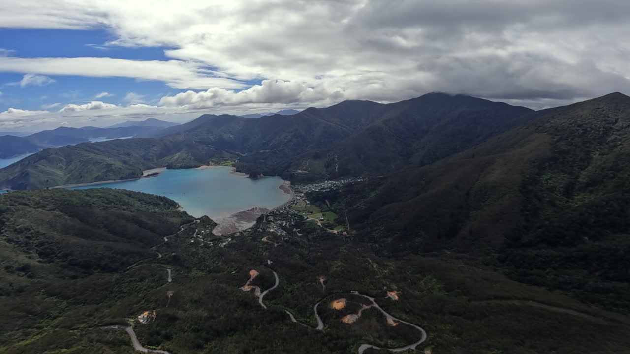 POV Helicopter flying over Ōkiwi Bay in the Marlborough sounds, New Zealand