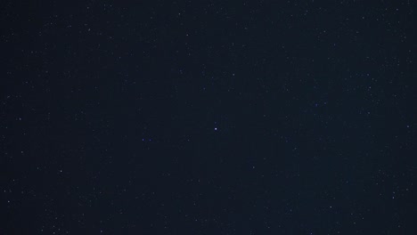 timelapse of stars in the night sky moving around the north star in a circle