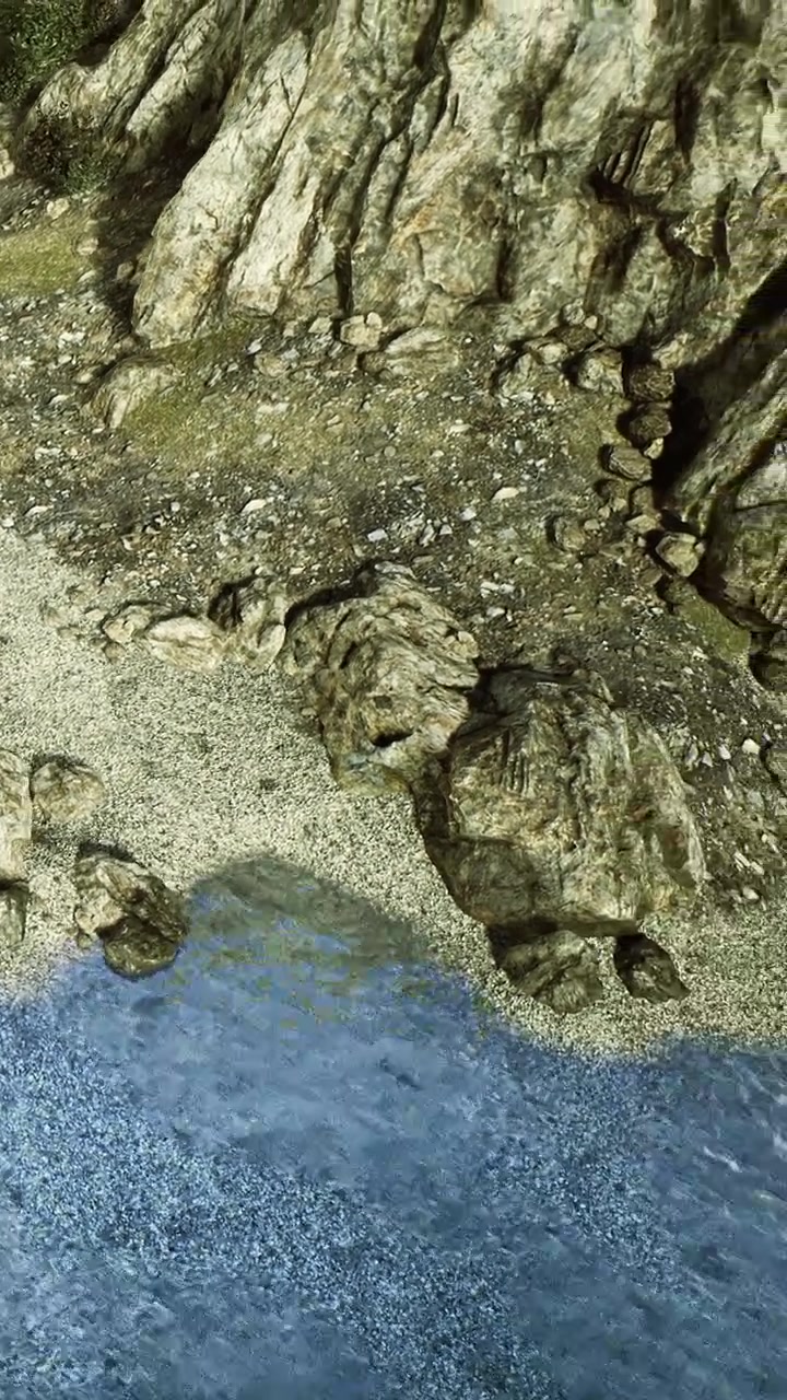 Costa rocciosa incontra acqua limpida in un ambiente naturale durante le ore diurne
