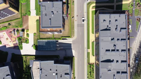 AERIAL:-Camera-Down-Shot-of-Buildings-and-Rooftops-of-the-Vilnius-City-District