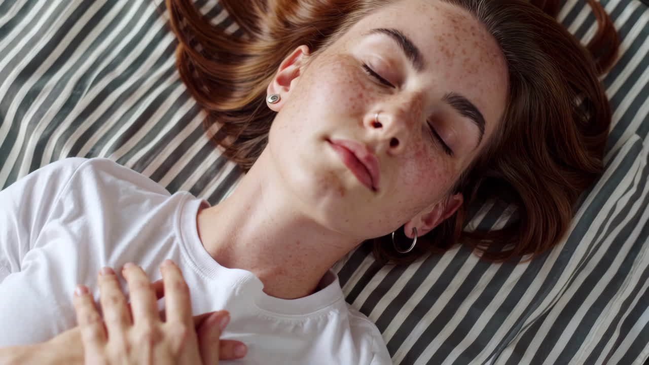 Young Woman Resting Peacefully with Closed Eyes