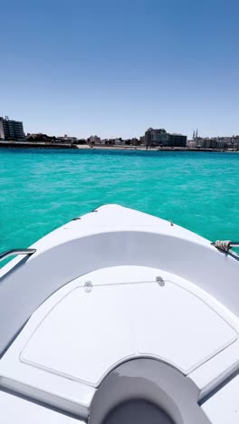 a view of a sea from a boat, close up shot
