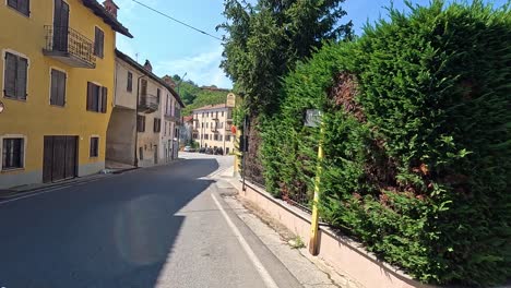 scenic drive showcasing vibrant houses and church