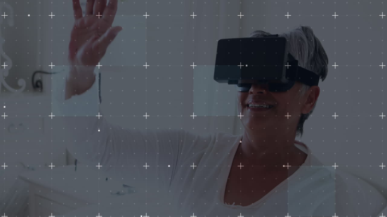 partículas blancas que se mueven por la red contra una mujer mayor afroamericana que usa auriculares vr