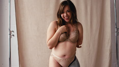 Studio-Shot-Of-Confident-Natural-Woman-With-Prosthetic-Limb-In-Underwear-Promoting-Body-Positivity