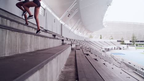 women athletes training at stadium