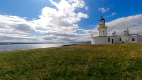 a timelapse of a very beautiful place in scotland showing cloud movement across the small lighthouse