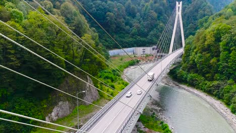 cable-stayed bridge over a mountain river