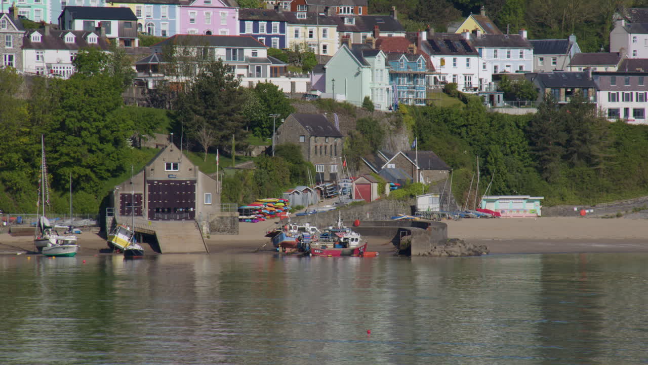 Long shot of new quay Lifeboat station. RNLI,