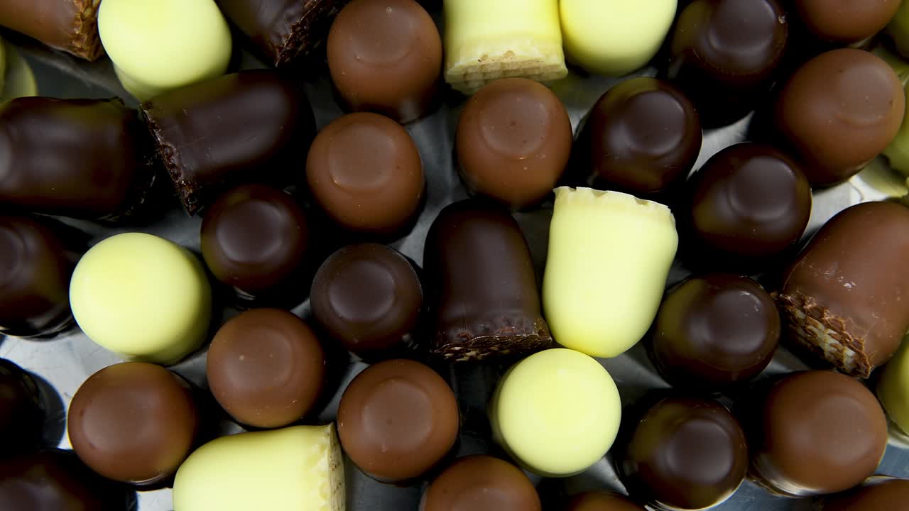 marshmallows de chocolate como imágenes de bucle sin costuras