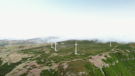 wind turbines on the mountain top in serra de agua, portugal