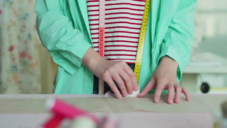 dressmaker working in her studio.