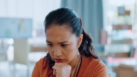 Serious,-thinking-and-woman-working-in-office