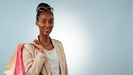 Black-woman,-shopping-bag-and-pointing