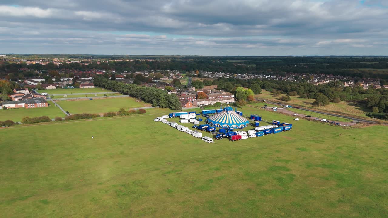 Circus Fantasia is neatly located on the field outside of Breckland. The shot is done on a cloudy autumn day, while sunrays are touching some parts of the field