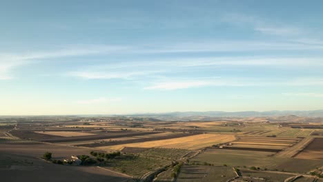 Timelapse-of-clouds-moving-over-farmland-in-the-early-morning-in-the-south-of-Italy-in-4k