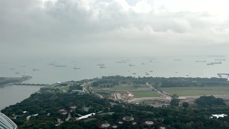 Observing-Gardens-By-The-Bay-from-Marina-Bay-Sands-in-Singapore---High-Angle-Shot