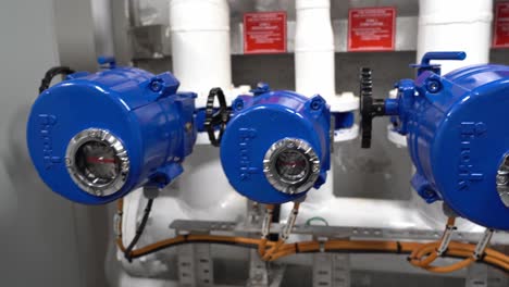 isolation valves for fire suppression system inside ships engine room - handheld