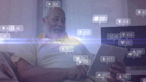 elderly man using tablet with social media notifications overlay animation