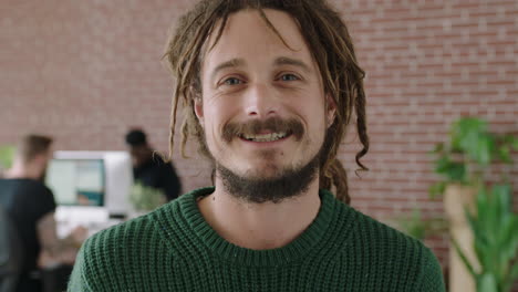 close-up-portrait-of-young-caucasian-man-smiling-happy-enjoying-successful-startup-business-confident-male-entrepreneur