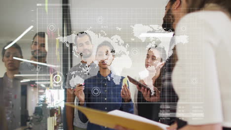 discussing global data animation, diverse team in modern office collaborating
