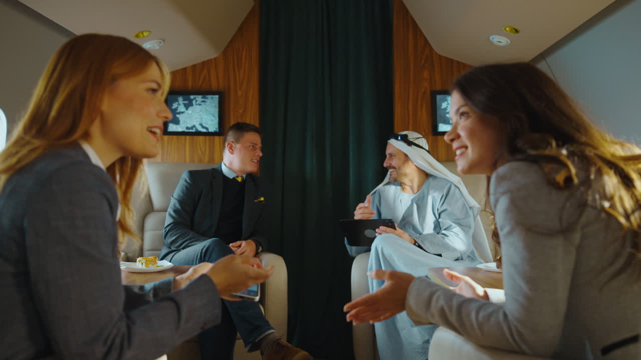 Businessmen Meeting on a Private Jet