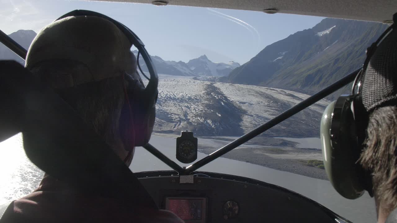 Helicopter Pilots Flight Around The Scenic Mountain Landscape In Alaska, USA - Closeup, Slow Motion
